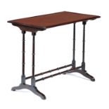 A REGENCY MAHOGANY TABLE the rectangular top on ring turned, coupled standards united by stretchers,