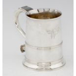 A GEORGE III SILVER MUG  the handle with cut card decoration and heart terminal, 15cm h, maker's