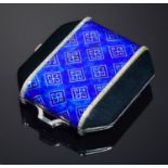 A  FRENCH ART DECO DIAMOND, GOLD AND LAPIS BLUE AND BLACK ENAMEL COMPACT, C1925   the interior