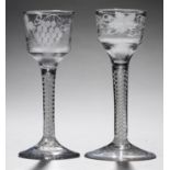 TWO ENGLISH WINE GLASSES, C1770  the ogee bowl engraved with grapevines on double series opaque