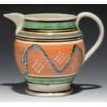 A MOCHA WARE JUG, C1830 with multi-chambered slip pot zig-zag cable decoration and white spots