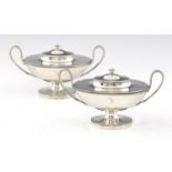 A PAIR OF GEORGE III OVAL SILVER SAUCE TUREENS AND COVERS with beaded rims, crested, 13.5cm h, by