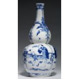 A CHINESE BLUE AND WHITE DOUBLE GOURD VASE, QING DYNASTY, 19TH C painted with four panels of a
