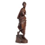 A NORTHERN EUROPEAN CARVED AND STAINED LIMEWOOD STATUETTE OF A YOUNG WOMAN, LATE 19TH C in classical