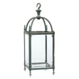 A BRASS HALL LANTERN, C1900 with bevelled glass lights, 57cm h including hook Oxidised/verdigris.