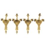 A SET OF FOUR FRENCH ORMOLU WALL LIGHTS, EARLY 20TH C  cast in high relief with rocaille and centred