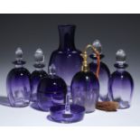 A FRENCH AMETHYST GLASS DRESSING TABLE SET, C1930  including a scent bottle with giltmetal