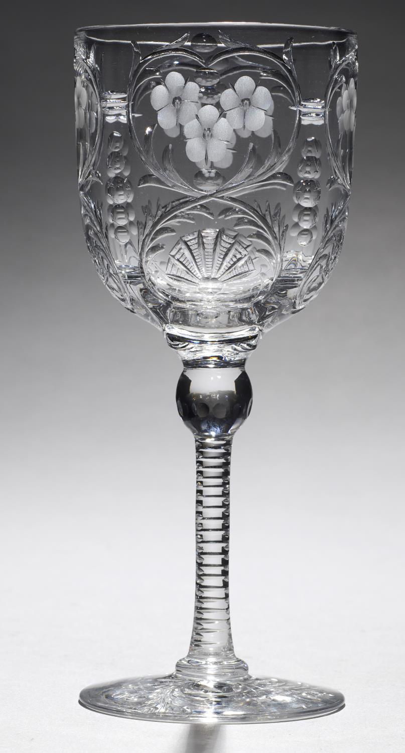 AN ENGLISH INTAGLIO ENGRAVED 'ROCK CRYSTAL' WINE GLASS, EARLY 20TH C  the bowl with panels of
