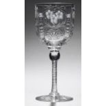 AN ENGLISH INTAGLIO ENGRAVED 'ROCK CRYSTAL' WINE GLASS, EARLY 20TH C  the bowl with panels of