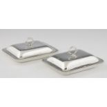 A PAIR OF GEORGE III GADROONED SILVER ENTREE DISHES AND COVERS  crested, 27.5cm l, by William