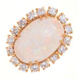 AN OPAL AND DIAMOND CLUSTER RING, THE OPAL CABOCHON 3.8CT APPROX, BRILLIANT CUT DIAMONDS 2CT APPROX,