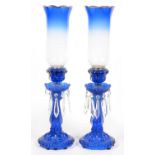 A PAIR OF BLUE GLASS LUSTRE CANDLESTICKS AND SHADES, 54CM H