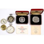 TWO COMMEMORATIVE SILVER CROWNS, ISLE OF MAN AND SIERRA LEONE 1974, CASED, A BRASS POCKET COMPASS