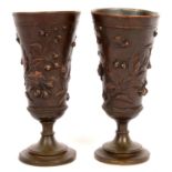 A PAIR OF BRONZED METAL BEAKER SHAPED VASES CAST WITH WILD STRAWBERRIES AND OTHER PLANTS, 15.5CM