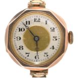 A 9CT GOLD LADY'S WRISTWATCH, ON GOLD PLATED BRACELET