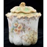 A ROYAL DOULTON BONE CHINA SHELL MOULDED BISCUIT BARREL AND COVER, PRINTED AND PAINTED WITH