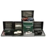 FOUR BENTLEY MOTORS UK BOXED DIE CAST MODELS OF VINTAGE BENTLEY MOTOR CARS AND ANOTHER CONTAINING