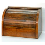 AN OAK STATIONERY CABINET WITH TAMBOUR SHUTTER, EARLY 20TH C, 43CM W