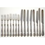 SEVEN GEORGE V SILVER FRUIT KNIVES AND SILVER HAFTED FRUIT FORKS, SHEFFIELD 1927 AND ANOTHER