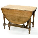 AN OAK GATELEG TABLE, EARLY 20TH C, 75CM H