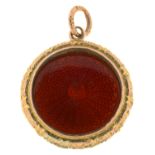 A GOLD AND RED GUILLOCHE ENAMEL LOCKET, UNMARKED, 2.5 CM DIAMETER, 12.5G
