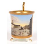 A GERMAN PORCELAIN CABINET CUP, FINELY PAINTED WITH A NAMED VIEW OF THE MARKET PLACE AT CARLSRUHE,