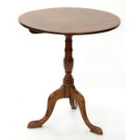 A VICTORIAN OAK TRIPOD TABLE WITH TILT TOP ACTION ON TURNED COLUMN, 72CM H X 66CM D