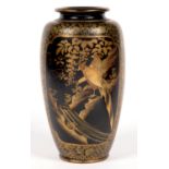 A JAPANESE BLACK AND GILT LACQUERED EARTHENWARE SHOULDERED OVIFORM VASE, WITH PANELS OF BIRDS AND