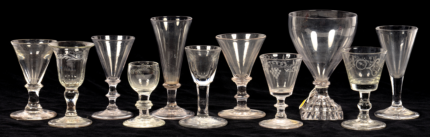 ELEVEN VARIOUS DRINKING GLASSES, LATE 18TH - EARLY 19TH C, SEVERAL ON FOLDED FOOT, THE LOT TO