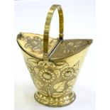 A VICTORIAN EMBOSSED BRASS COAL BUCKET