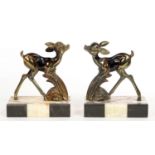 A PAIR OF ART DECO PATINATED METAL SCULPTURES OF FAWNS, ON MARBLE BASE, 16CM H, C1930