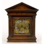 A WALNUT ARCHITECTURAL TYPE MANTEL CLOCK WITH BRASS AND SILVERED DIAL, EARLY 20TH C, 38CM H X 31CM W