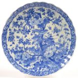 A JAPANESE FLUTED BLUE AND WHITE IMARI CHARGER, TRANSFER PRINTED WITH BIRDS AND FOLIAGE, 37CM D,