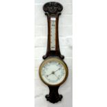 A CARVED OAK ANEROID BAROMETER, EARLY 20TH C, 80CM H