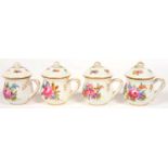 A SET OF FOUR CONTINENTAL PORCELAIN CUSTARD CUPS AND COVERS, PAINTED WITH A LOOSE BOUQUET AND