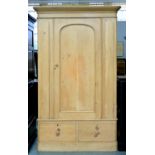 A PINE WARDROBE WITH PANELLED DOOR, 210CM H X 118CM W