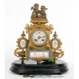 A FRENCH PORCELAIN INSET GILTMETAL MANTEL CLOCK IN LOUIS XV STYLE, THE DIAL AND PANELS PAINTED