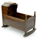 AN EARLY 19TH C PANELLED OAK CRADLE, 70CM H; 82 X 40CM