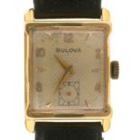 A BULOVA GOLD GENTLEMANS' WRISTWATCH, MARKED 14K, LEATHER STRAP, 2.1 CM DIAL