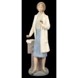 A NAO PORCELAIN FIGURE OF A DOCTOR, 31.5CM H, PRINTED MARK