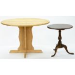 A PINE TABLE ON PEDESTAL BASE WITH CIRCULAR TOP, 74CM H X 110CM D AND A MAHOGANY TRIPOD TABLE,