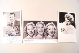 A group of seven music industry autograph post cards,