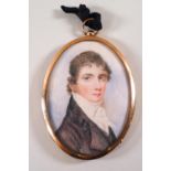 A portrait miniature of a gentleman in black coat and white stock, painted on ivory, circa 1810,