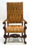 A carved hardwood Daniel Marot style armchair with upholstered rectangular back