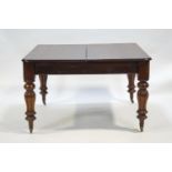 A William IV mahogany extending dining table with two extra laves,