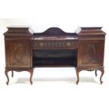 An eighteenth century style mahogany sideboard of big proportions,