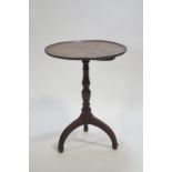 A Georgian mahogany tripod table of traditional form,