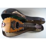 A Silvestri mandolin with mother of pearl decoration,
