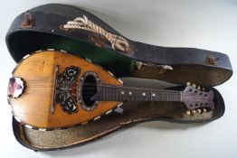 A Silvestri mandolin with mother of pearl decoration,