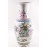 A 20th century Chinese porcelain vase painted in coloured enamels with figures in a landscape,